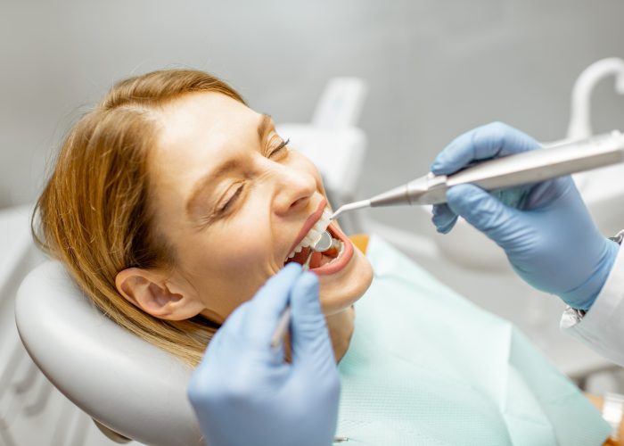 Woman during a teeth inspection at the dental office
